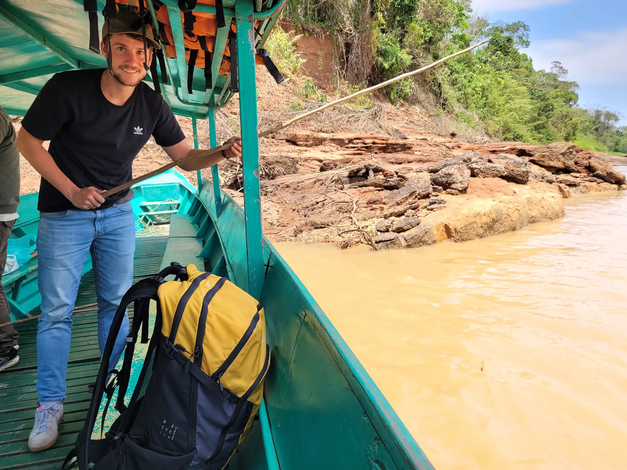 Boat ride on muddy Amazon water