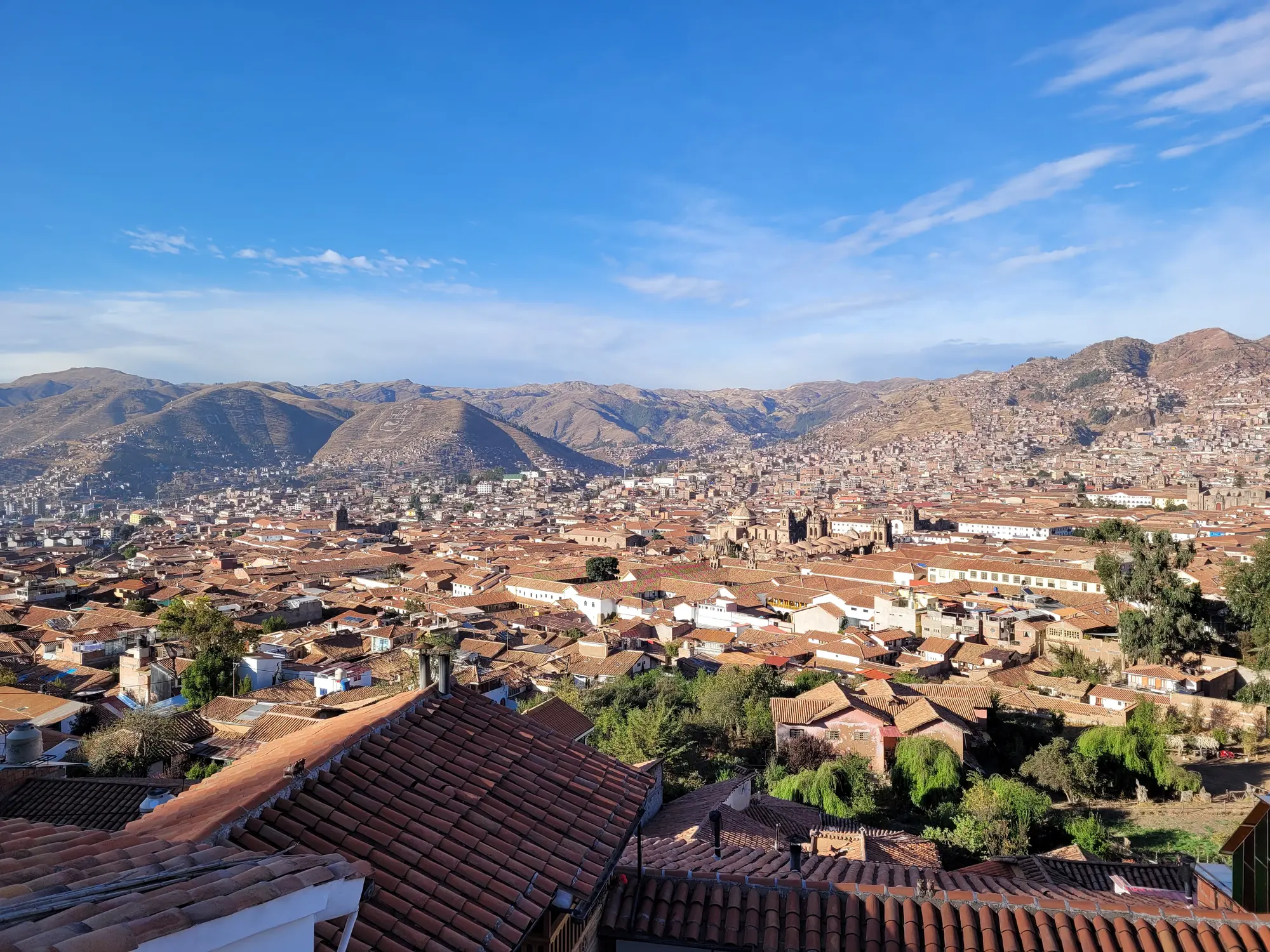 Cusco city and surrounding hills from above