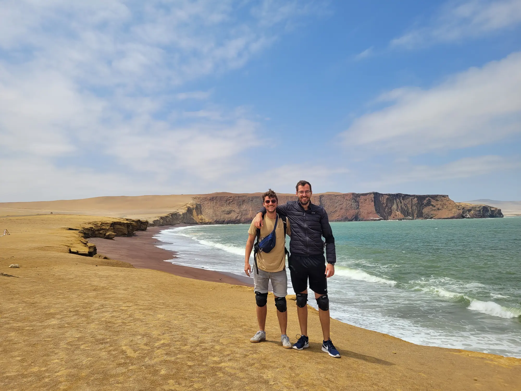 Standing with a friend at the Paracas coast