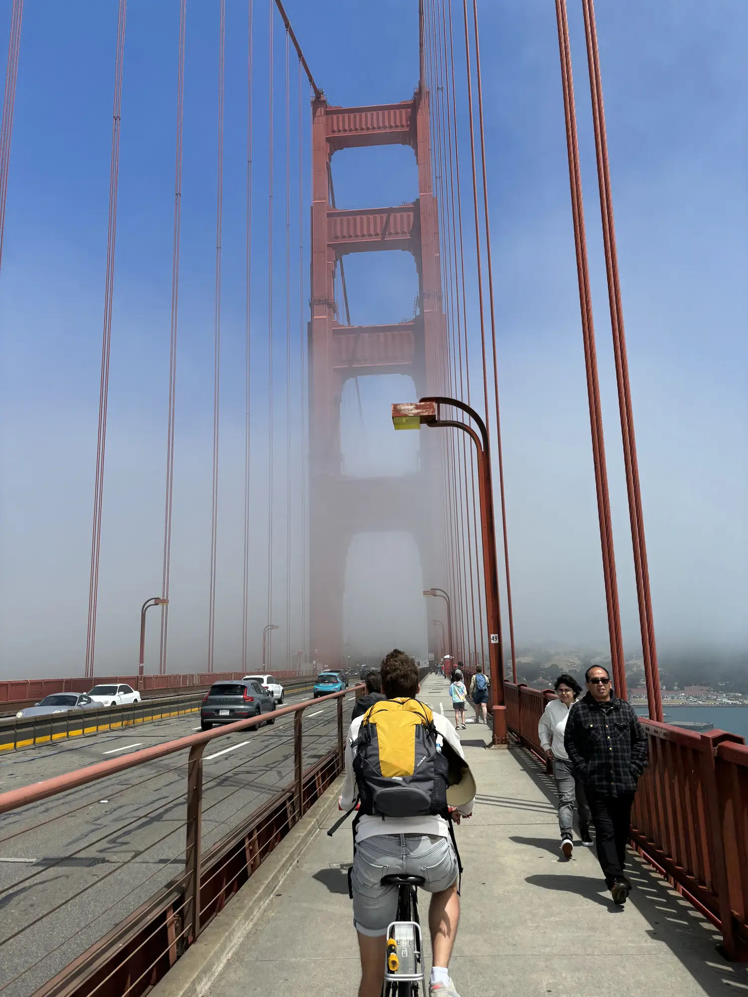 Cycling across the Golden Gate Bridge in the fog