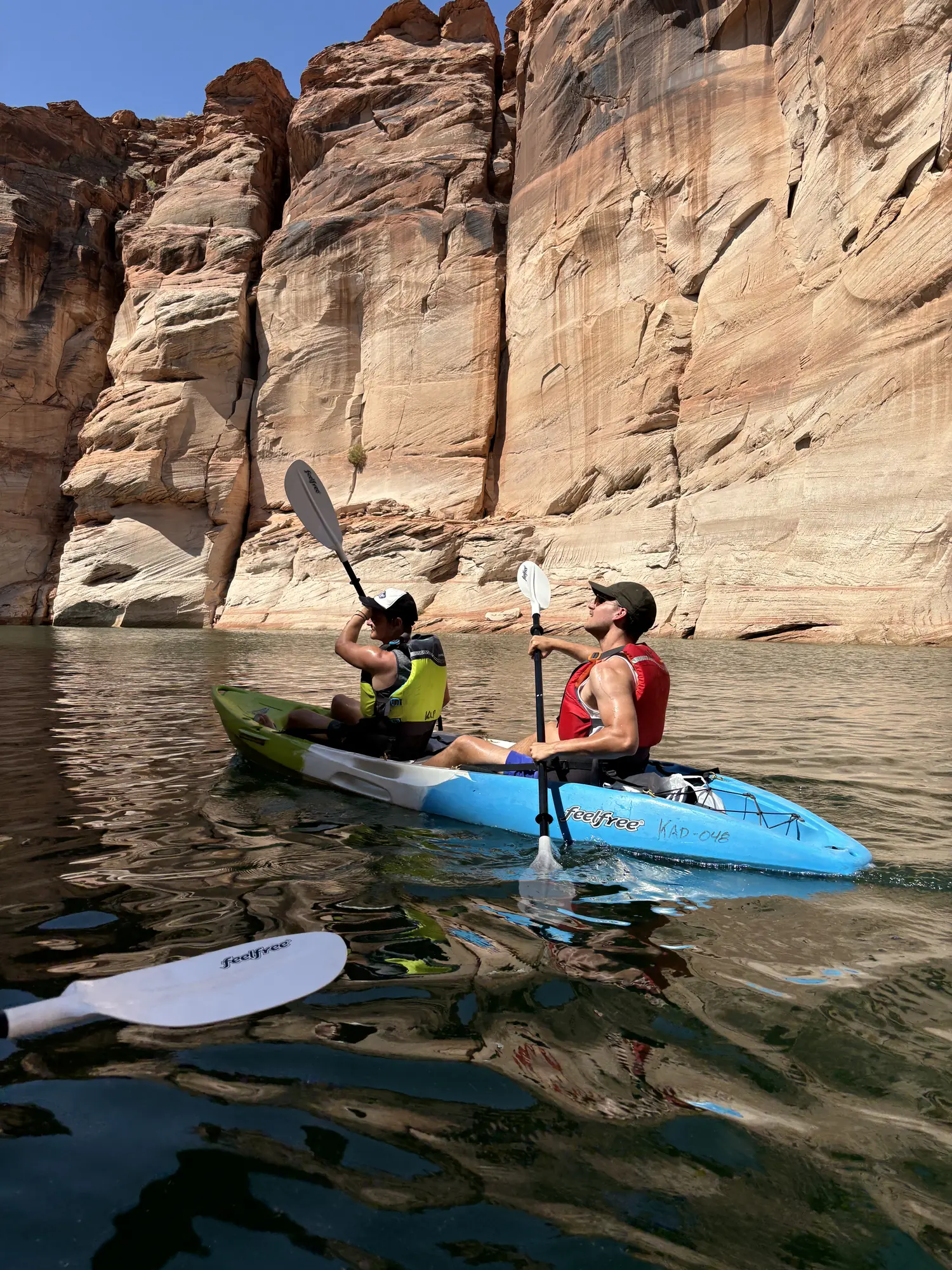 Kayaking on the Colorado River between canyon walls