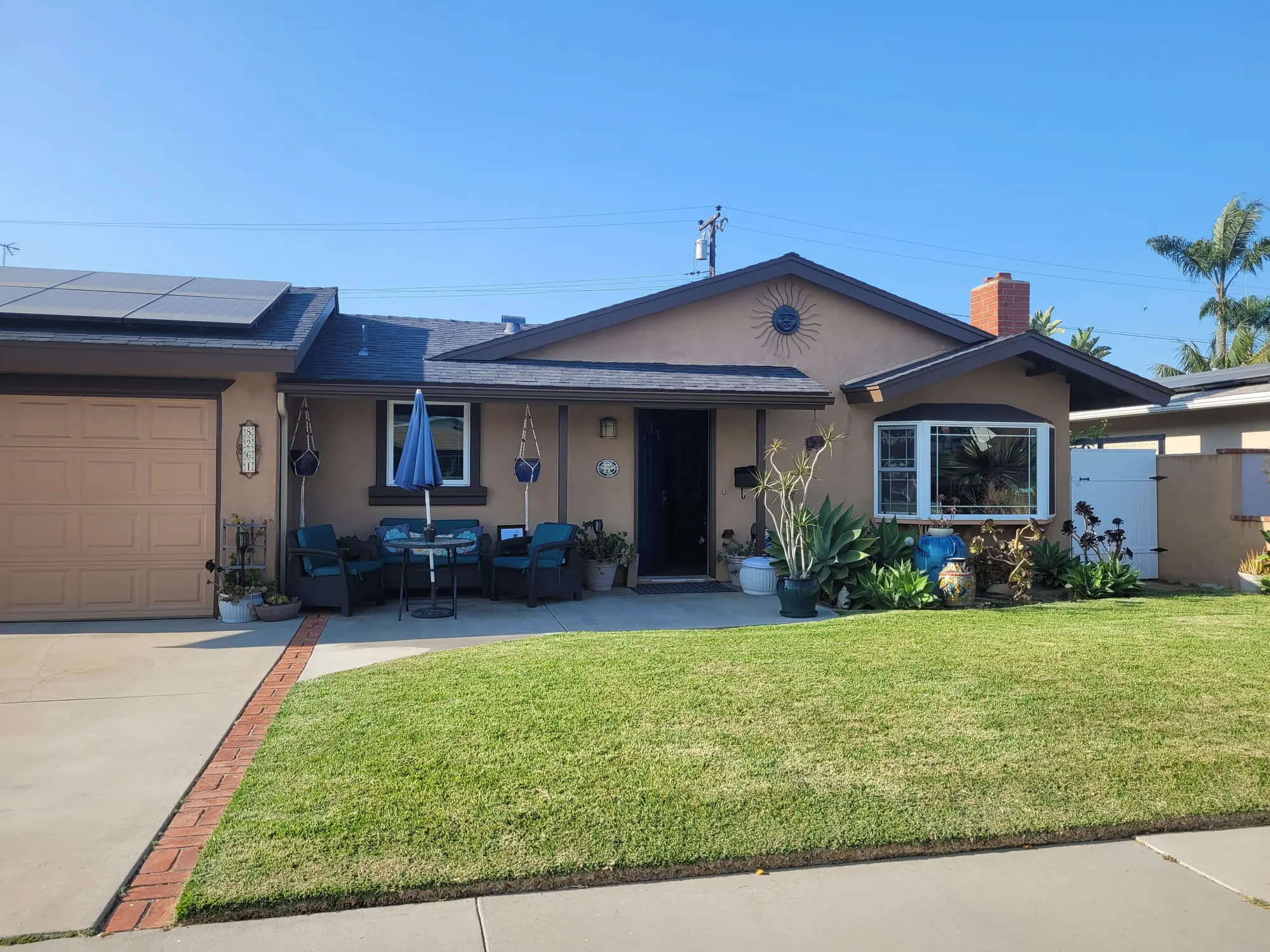 Single-story Los Angeles suburban house with a driveway and front lawn